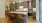 kitchen island with pendant lighting and bar chairs
